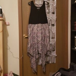 Black tshirt top and handkerchief hem dress